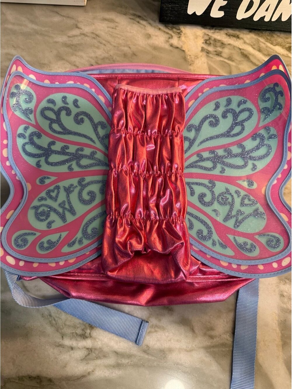 The Flutter Wings Doll Carrier is a WellieWishers accessory